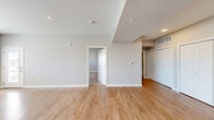 Located at 485 S 44th St W in Billings, Montana, this one-bedroom, one-bathroom unit offers a well-designed, efficient floor plan across a single level. The open-concept living, dining, and kitchen area is bright and welcoming, featuring light hardwood-style flooring that extends throughout the main living spaces. Large windows allow natural light to fill the room, offering views of the surrounding Billings landscape.

The kitchen is thoughtfully appointed with rich dark cabinetry, a classic subway tile backsplash, stainless steel appliances including a gas range, refrigerator, and dishwasher, and a built-in sink — ideal for everyday cooking and entertaining.

The bedroom is carpeted for comfort and includes a window with an outdoor view, along with generous closet storage. Multiple closets throughout the unit provide ample organization space. The bathroom is designed with accessibility in mind, featuring sturdy grab bars and hardwood-style flooring consistent with the rest of the unit.

Neutral gray walls and clean white trim create a modern, cohesive aesthetic throughout. Recessed lighting and ceiling-mounted smoke detectors reflect thoughtful construction. This unit combines practical functionality with contemporary finishes in a comfortable Billings location.