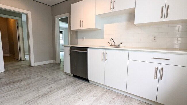 Photo du bâtiment - Bright And Cozy One-Bedroom In Downtown Ki...