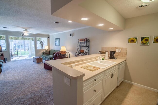 Building Photo - LAKE VIEWS and Completely Furnished