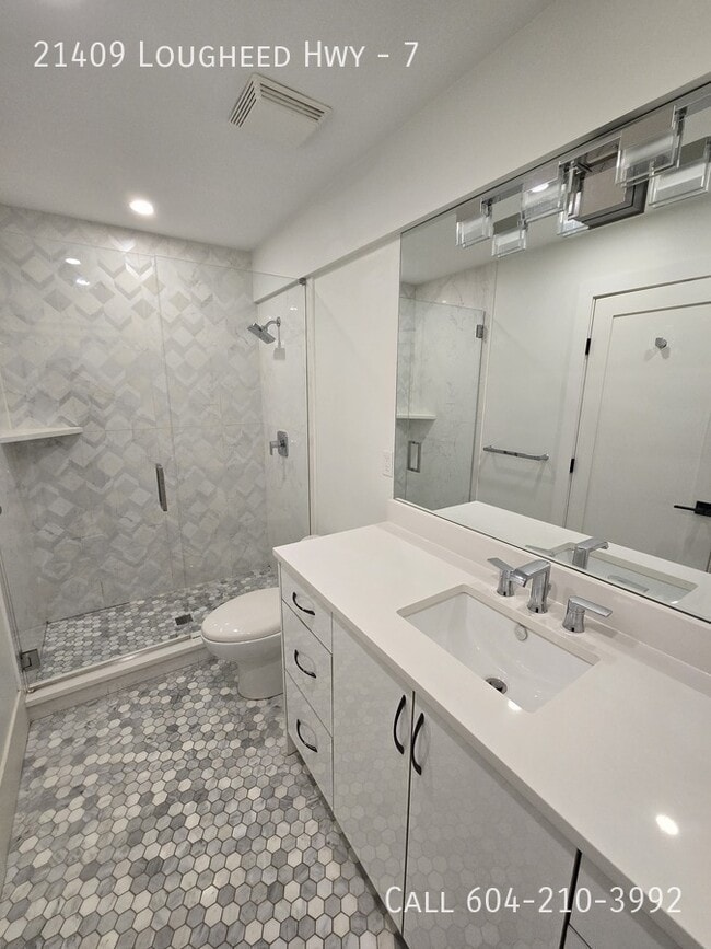 Building Photo - Spacious and Renovated Suite on Lougheed  Hwy - Utilities Included