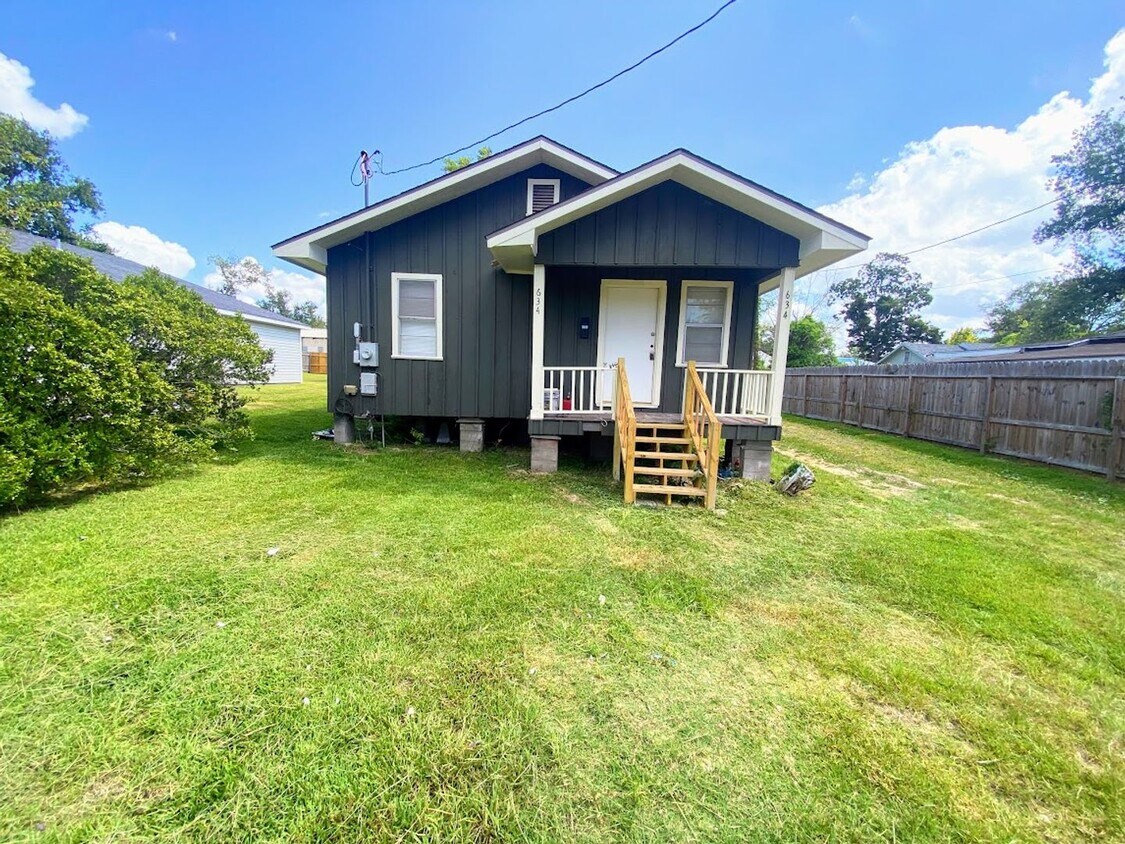 Primary Photo - Charming Downtown Living: Half Off First M...