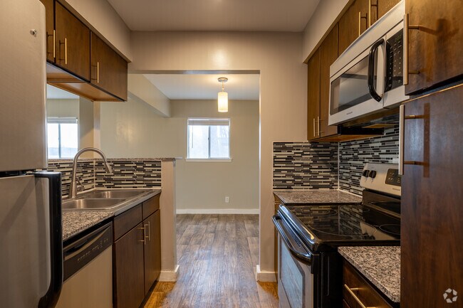 2BR Vacant Kitchen - The 209 Apartments