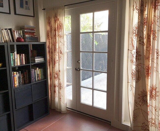 Front door (furniture of prior tenant) - 1620 N Genesee Ave