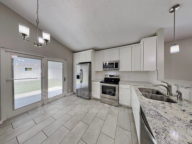 Building Photo - 6879 Belmar Dr