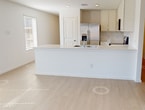 This contemporary 3-bedroom, 2-bathroom home in Montgomery, TX offers 1140 square feet of thoughtfully designed living space. The single-story layout promotes easy accessibility and flow throughout the residence. Upon entering, you're greeted by an open-concept design that seamlessly integrates the kitchen, living, and dining areas. The kitchen showcases sleek white cabinetry, stainless steel appliances, and ample counter space, making it ideal for culinary enthusiasts.

The primary bedroom, measuring 170 square feet, provides a generous retreat with an en-suite bathroom. Two additional bedrooms offer comfortable accommodations for family or guests. Both bathrooms feature modern fixtures, including combination tub-showers and vanities with storage.

Throughout the home, you'll find a cohesive design aesthetic with neutral tones and clean lines. Light-colored flooring – a mix of carpet in bedrooms and wood-look surfaces in common areas – enhances the bright, airy ambiance. Ceiling fans in multiple rooms provide added comfort and air circulation.

Additional amenities include a dedicated laundry room, strategically placed windows for natural light, and a closet for storage. The property's layout, as seen in the 3D floor plan, ensures efficient use of space while maintaining a sense of openness. Located at 759 Crow Feather in Montgomery, this home offers a blend of style, functionality, and modern living.