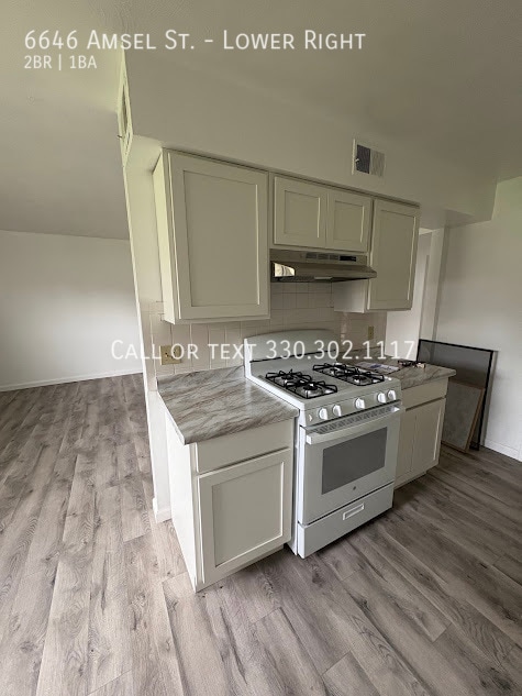 Building Photo - 6646 Amsel Ave NE