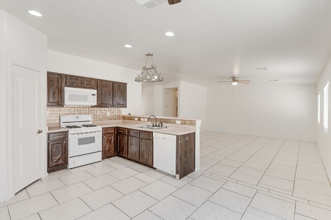 Building Photo - Charming 3-Bedroom Home with Open Living a...