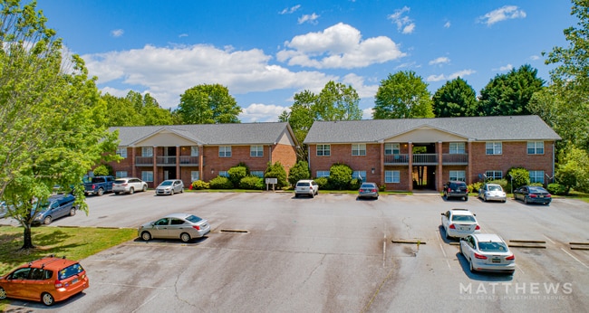 photo 1 logo - Crown Point Apartments