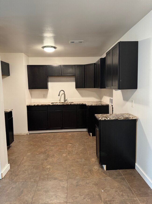 Foto del edificio - 4134 W 23rd Ave