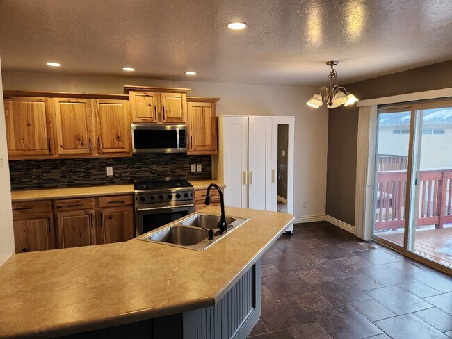 Kitchen, gas stove & newer appliances - 1281 Lily Pad Dr
