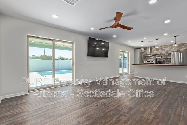 Foto del edificio - 5723 E Estrid Ave