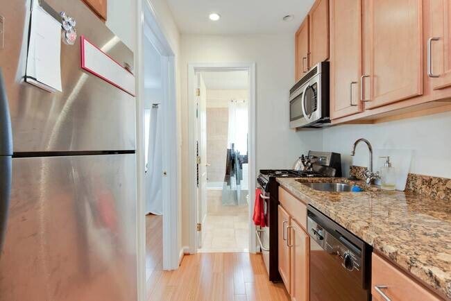 Kitchen with stainless steal appliances - 94 Webster St NE