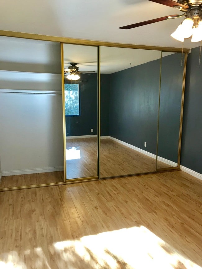 large bedroom w/ walk-in closet - 212 S Kraemer Blvd