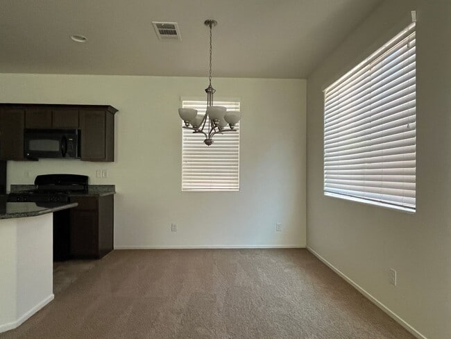 Building Photo - Lovely 2 story home with 3 large bedrooms, 2.5 baths and a 2 car garage.