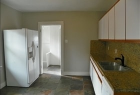 Building Photo - 3 BD. 1 BA. Granite Counters. Wood Floors
