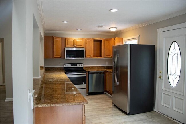 Foto del edificio - 9032 Tarnwood Cir