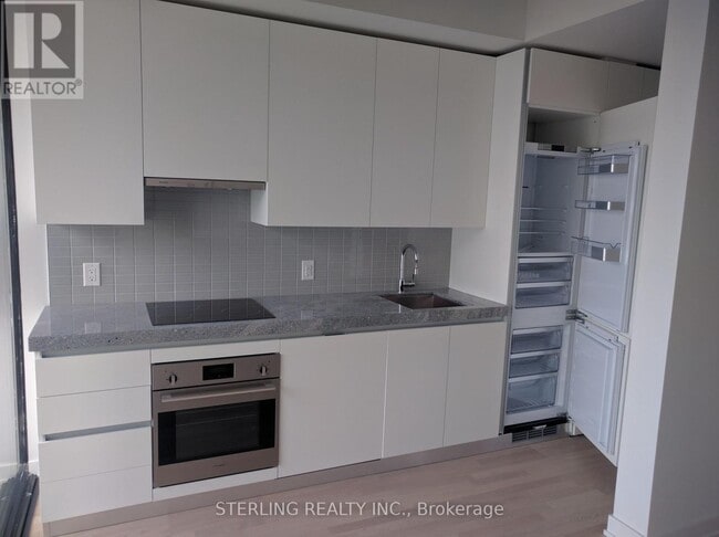 Photo du bâtiment - 625-629-629 King St W