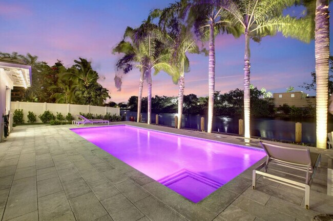 Building Photo - Lakefront Family Fun Home with Private Doc...