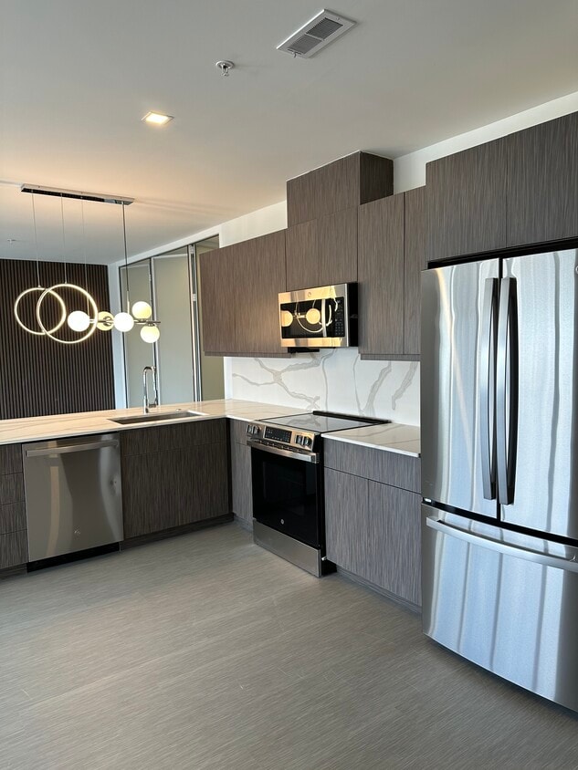 2 Bedroom 1 Bathroom- Kitchen - The Deneau