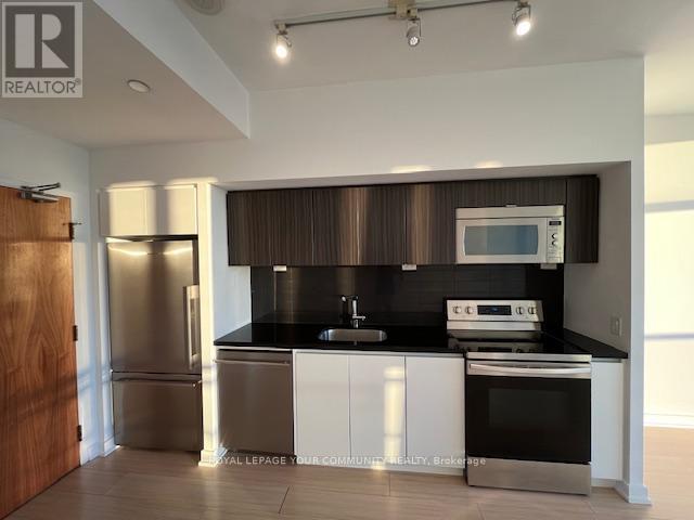 Photo du bâtiment - 75-4775 Queens Wharf Rd