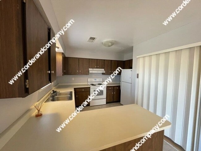 Building Photo - Charming 3 Bedroom, 1 3/4 Bathroom, 2 Car ...