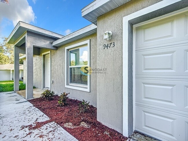 Building Photo - 9473 N Athenia Dr