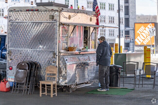 There are many food trucks under Route 8 near the Derby & Shelton train station.