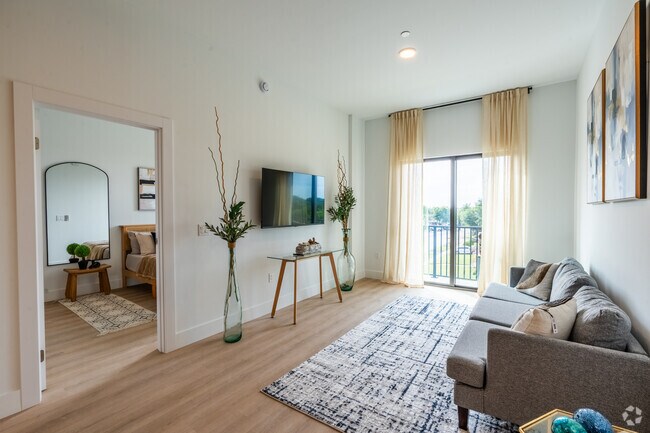 2 habitaciones, 2 baños - 820 pies cuadrados - Sala de estar - Brand-New Apartments at SORA-Modern Living in the Heart of It All...