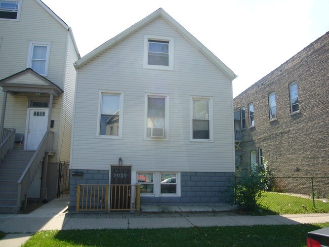 Building Photo - 5025 W 29th Pl