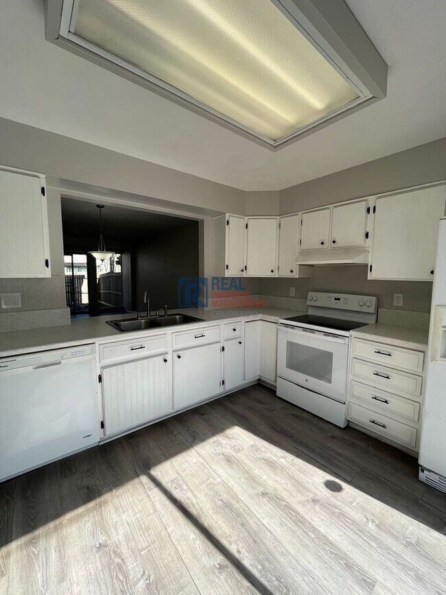 Building Photo - 7900 W Layton Ave