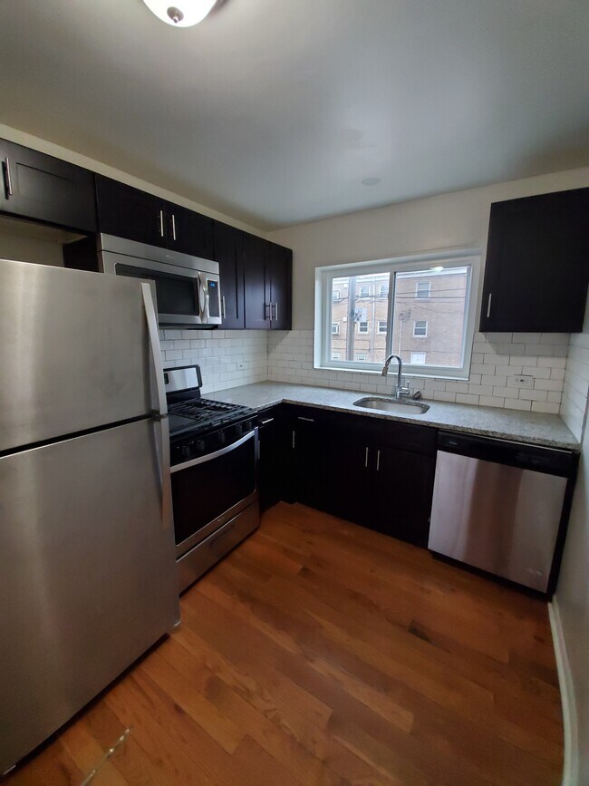 Foto del edificio - 7549 N Bell Ave