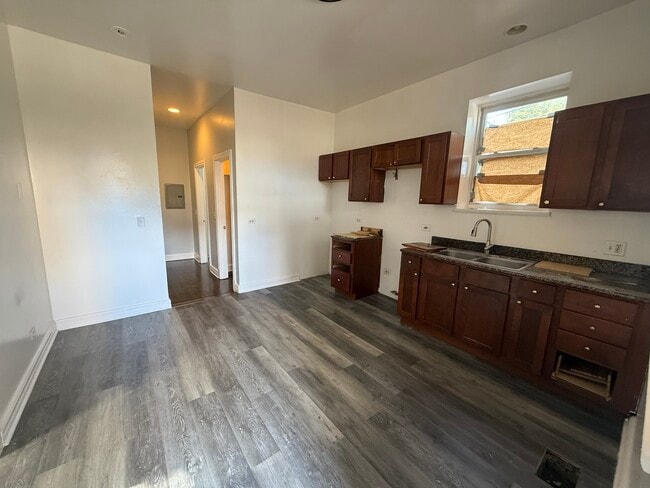 Building Photo - 1239 S Spaulding Ave