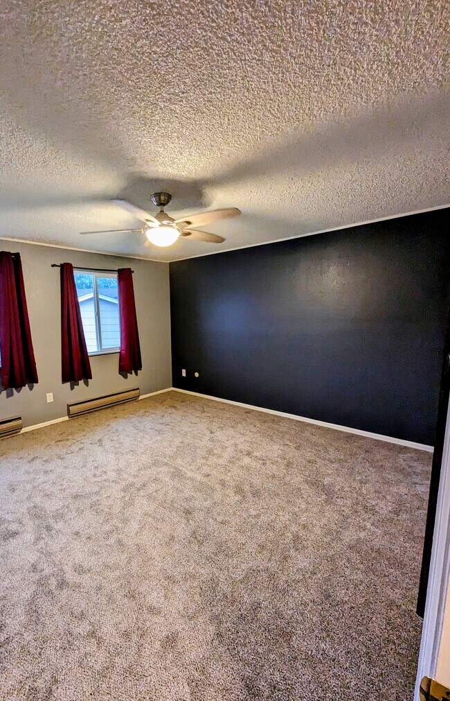 Master bedroom with 2 closets - upstairs. All new flooring! - 4666 S Garland Way