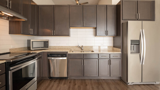 Kitchen with Stainless Steel Appliances - Flora