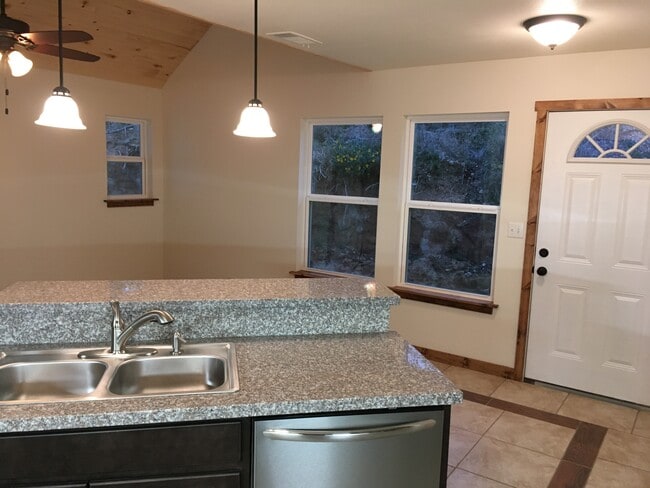 Kitchen Island overlooking into dining area - 117 S Kaupo Dr