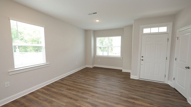 Building Photo - Brand New, End Unit Townhome Close to Down...