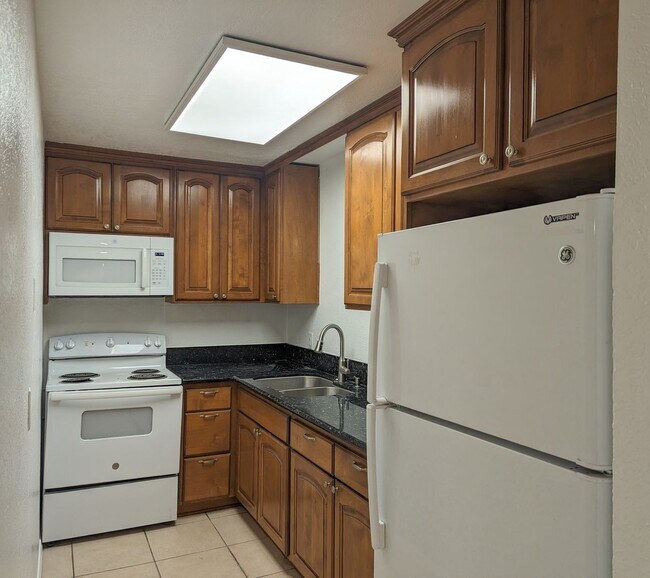 Building Photo - One Bedroom Ground Floor Condo - End Unit