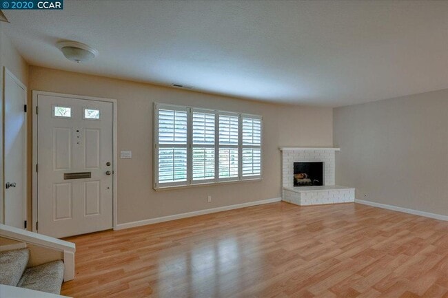living room with gas fireplace - 102 Miramonte Dr