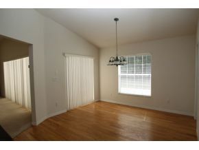 Dining areas with hard wood floors - 3434 SW 10th Terrace