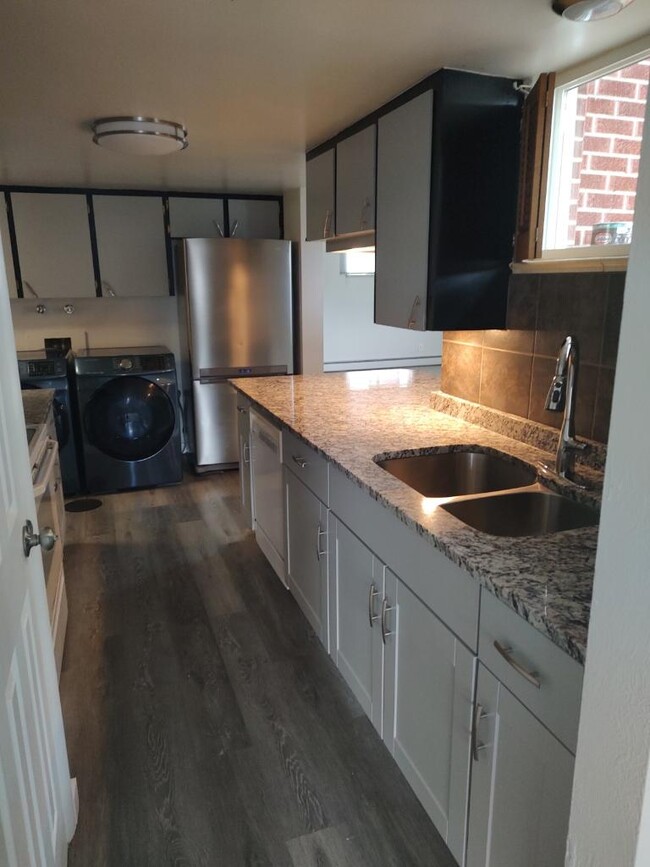 New flooring and granite countertops - 6560 W 44th Pl