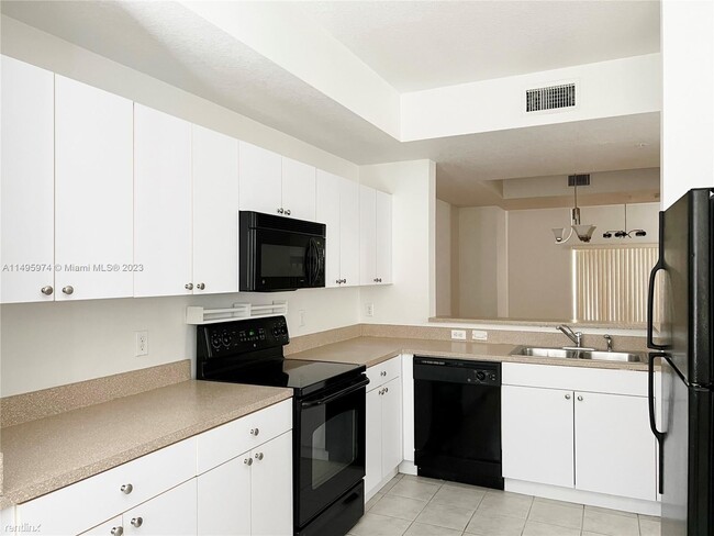 Building Photo - 3 br, 3 bath House - 8940 NE 8th Ave Unit ...