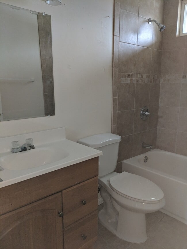 Tile main bath - 3614 Seacrest Way