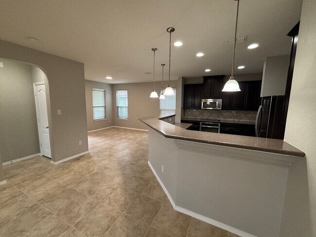 Building Photo - Spacious 3-Bed, 2-Bath Home with Covered P...