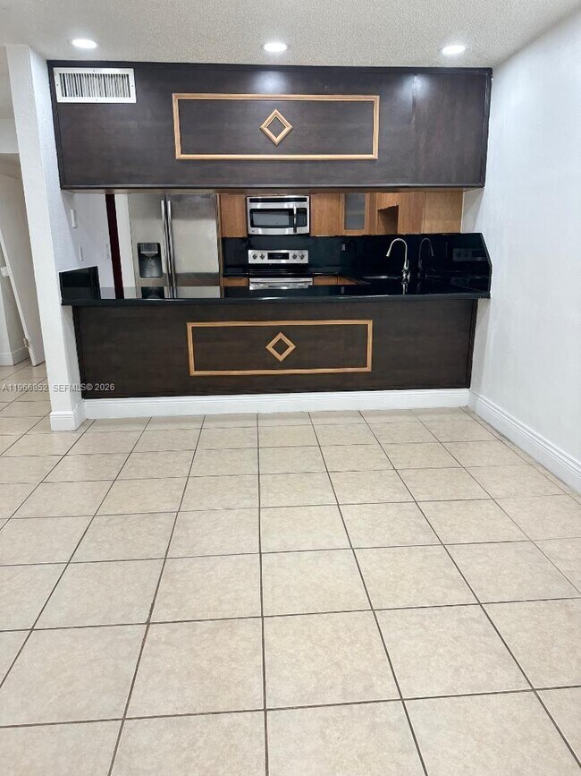 Foto del edificio - 7205 W 3rd Ave