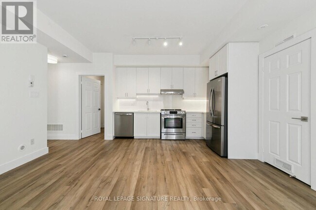 Building Photo - 5035 Oscar Peterson Blvd