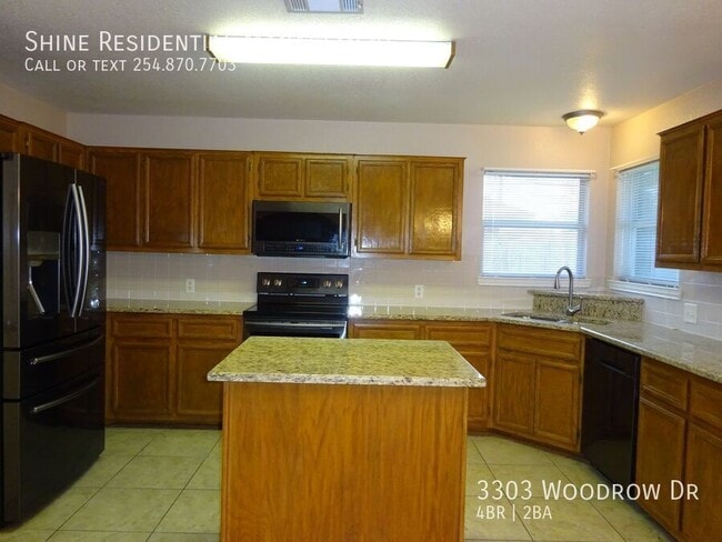 Foto del edificio - 3303 Woodrow Dr