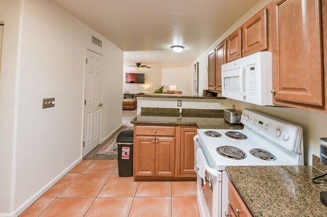 Building Photo - Move In Special- Serene 2-Bed Condo Catali...