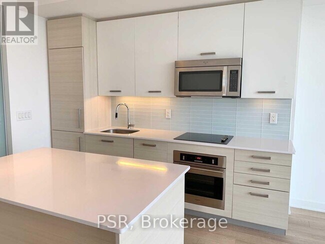 Photo du bâtiment - 210-1210 Simcoe St