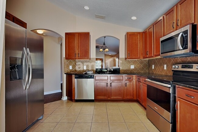 Building Photo - 18025 Cypress Bay Pky