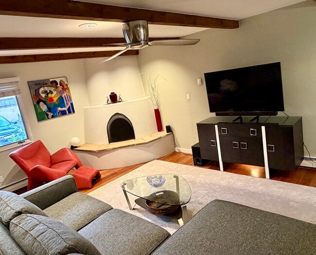 Kiva fireplace - 615 Bishops Lodge Rd